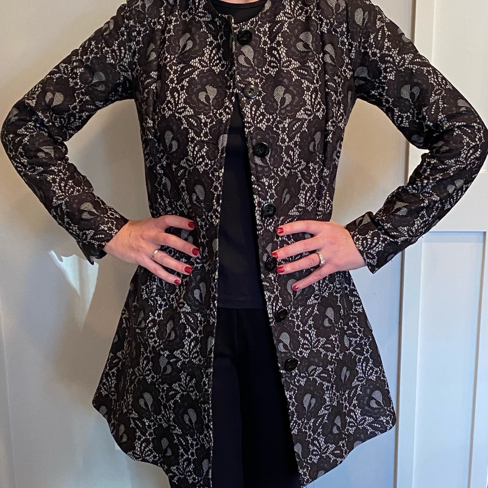 Elegant blazer by Cabe in black lace pattern.